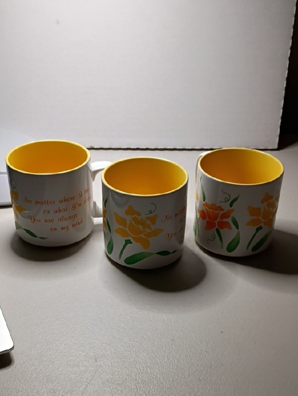 Russ Berrie White Mug with Yellow Interior and Orange Floral Accents